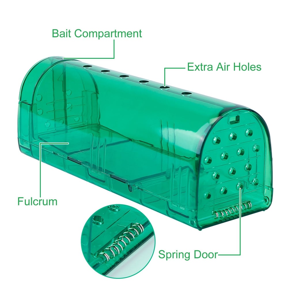 Transparent green bait station with labeled features including bait compartment, extra air holes, fulcrum, and spring door, designed for efficient pest control.