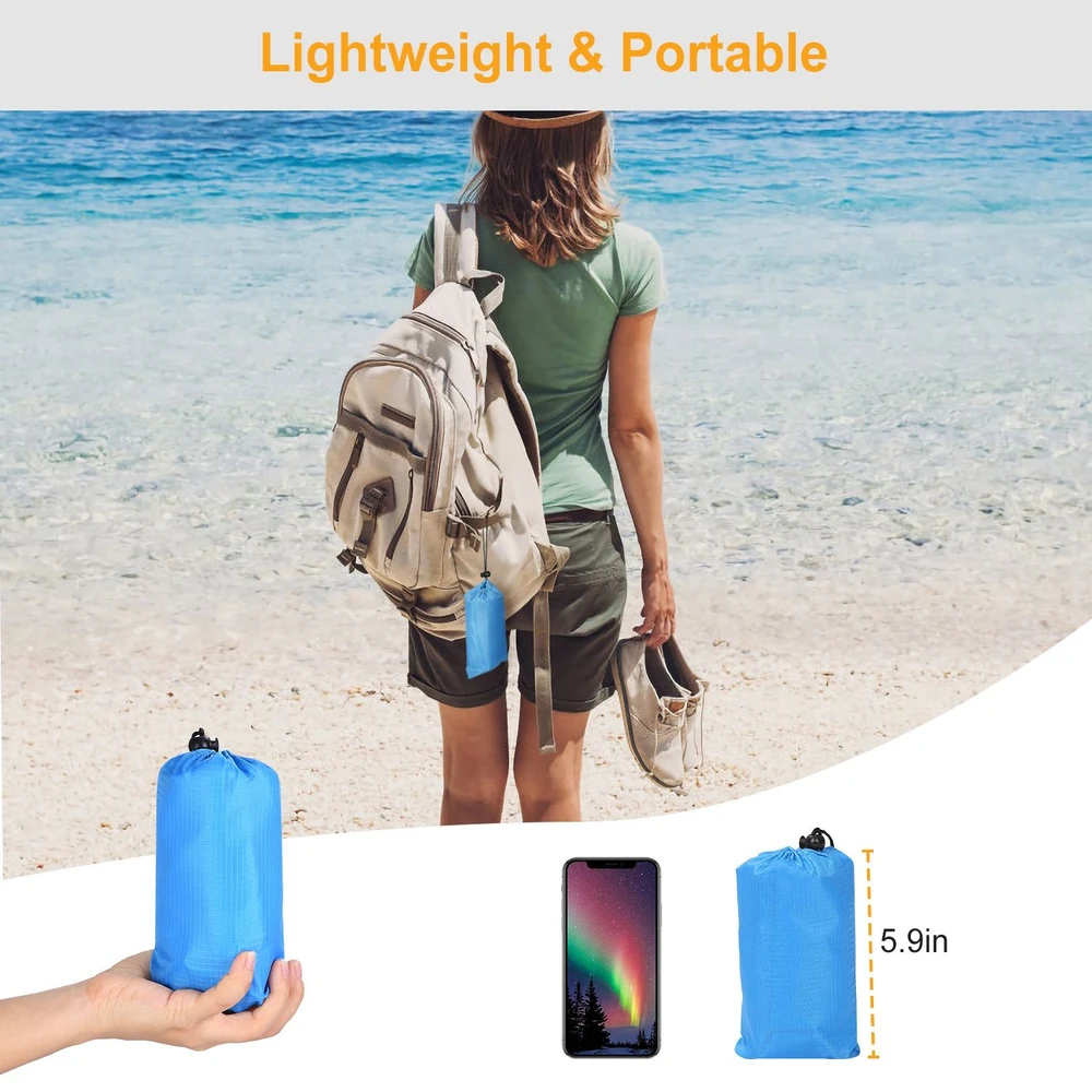 Woman at the beach holding a light blue, portable backpacking product, showcasing lightweight design and compact size next to a smartphone for scale.
