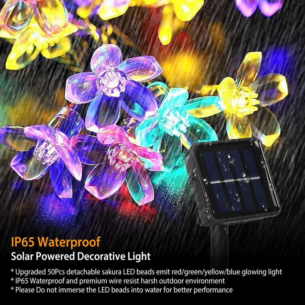 Colorful solar-powered decorative lights with sakura-shaped LED beads in red, green, yellow, blue, and pink, featuring an IP65 waterproof solar panel for outdoor usage.