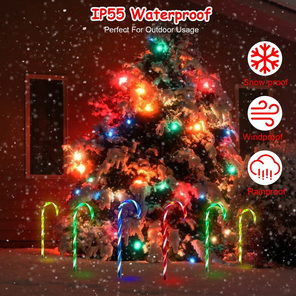 Colorful LED candy cane pathway lights in front of a snow-covered Christmas tree, showcasing IP55 waterproof rating and outdoor durability features like snow-proof, windproof, and rainproof options.
