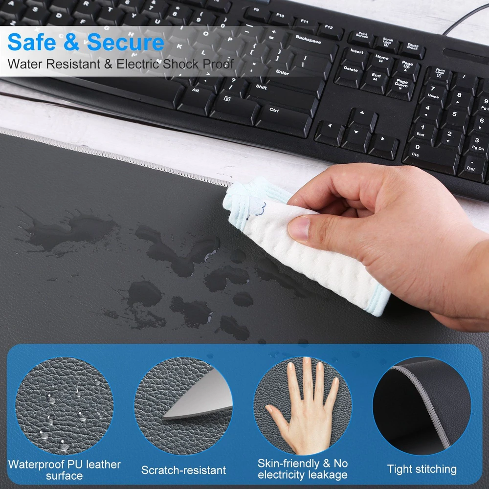 Close-up of a hand cleaning a waterproof PU leather desk mat with water droplets, showcasing its scratch-resistant and electric shock-proof features, alongside a black keyboard.