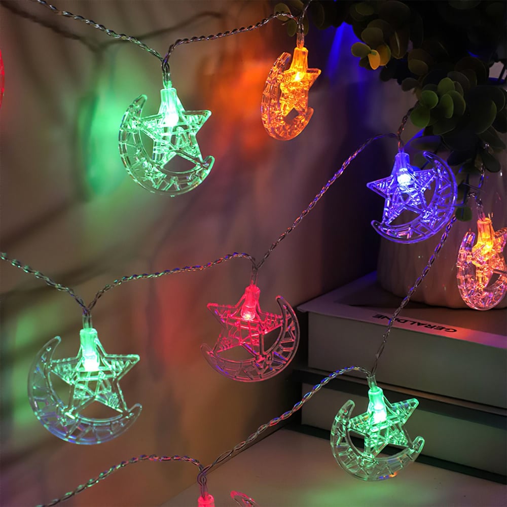 Colorful star and moon string lights glowing in various colors, perfect for festive decorations.