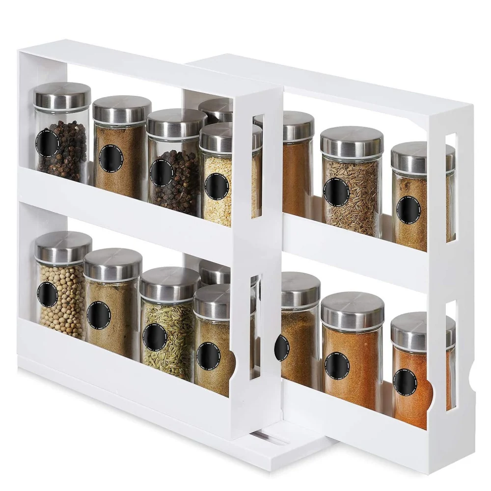 Modern white spice rack with twelve labeled glass spice jars featuring stainless steel lids, designed for easy organization and accessibility in the kitchen.