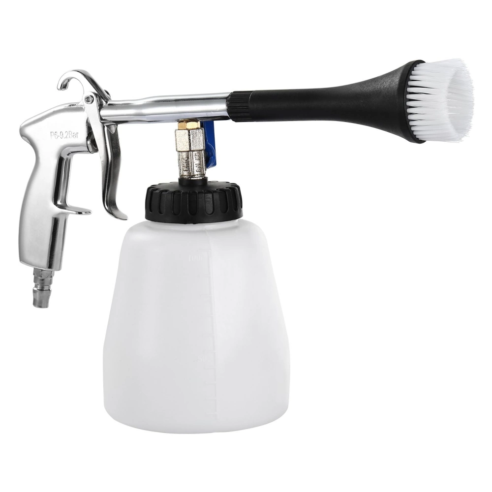 Air spray gun with adjustable nozzle and attached white container for car detailing and cleaning tasks.