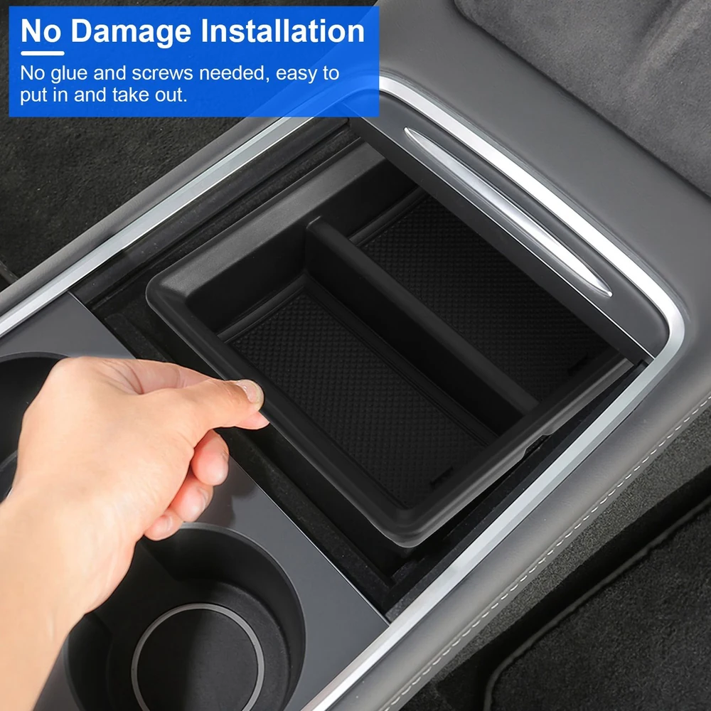 Hand placing a removable, no-damage installation organizer tray into a car's center console, showcasing its easy-to-use design and compartments for better organization.
