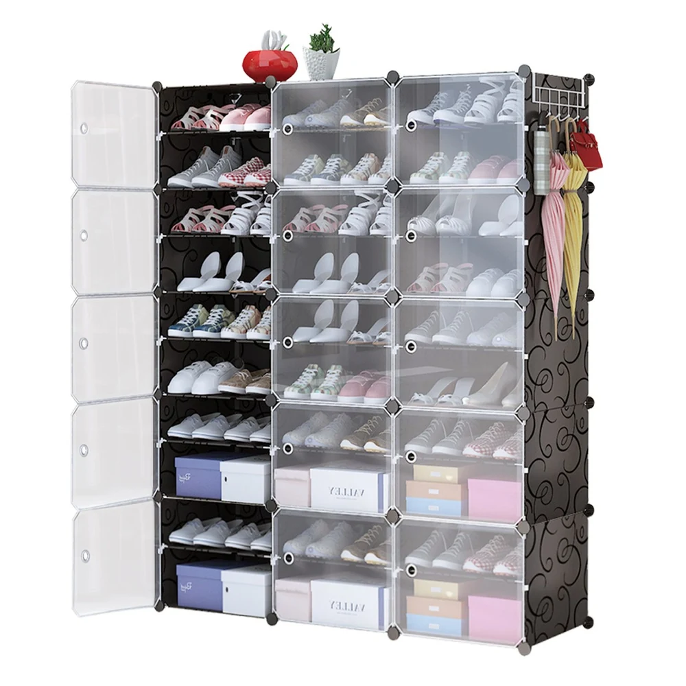 Clear plastic shoe organizer with multiple compartments, featuring a stylish black and white design, neatly displaying various pairs of shoes and accessories like umbrellas and handbags.