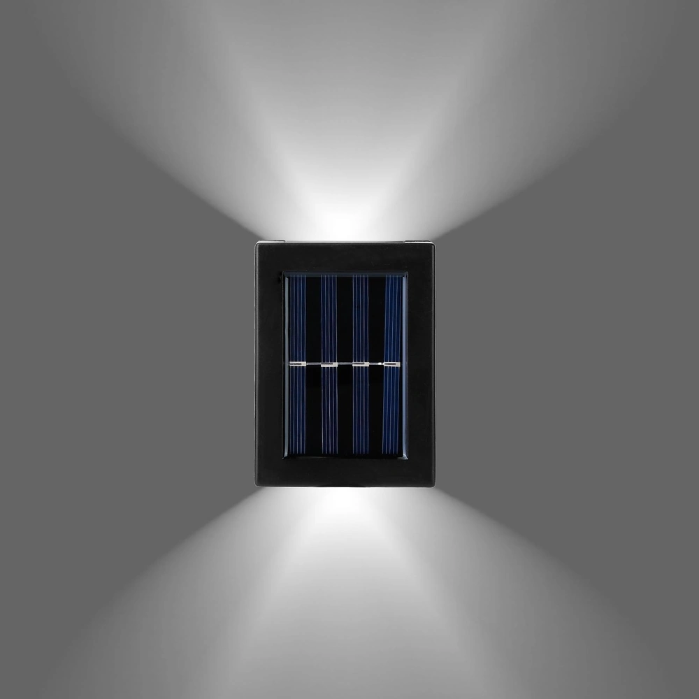 Solar-powered outdoor wall light with sleek black design and bright LED illumination, showcasing solar panels for eco-friendly energy efficiency.