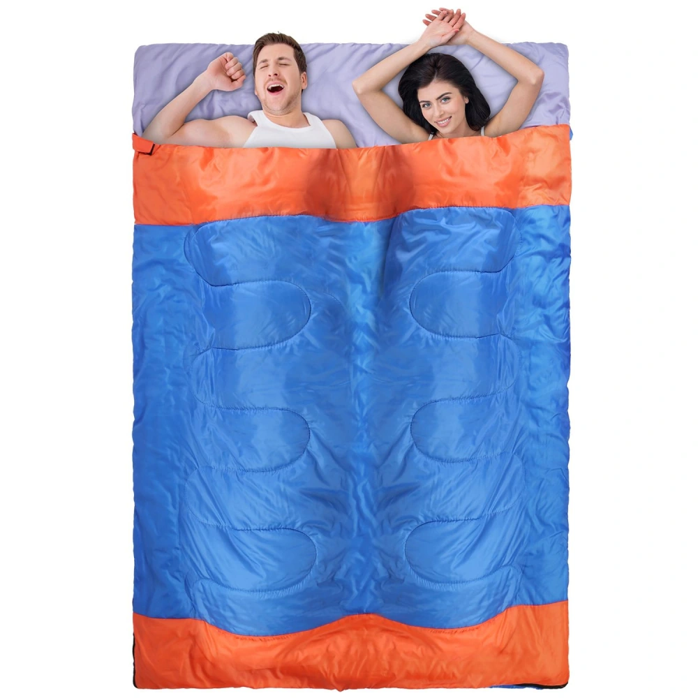Double sleeping bag in vibrant blue and orange, featuring two people comfortably relaxing inside, ideal for camping or outdoor adventures.