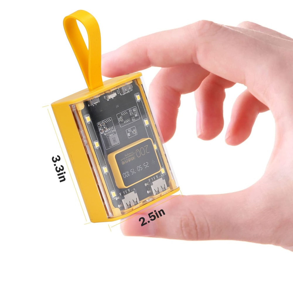 Compact yellow power bank being held between fingers, showcasing its dimensions of 3.3 inches by 2.5 inches, highlighting its lightweight and portable design for charging devices on the go.