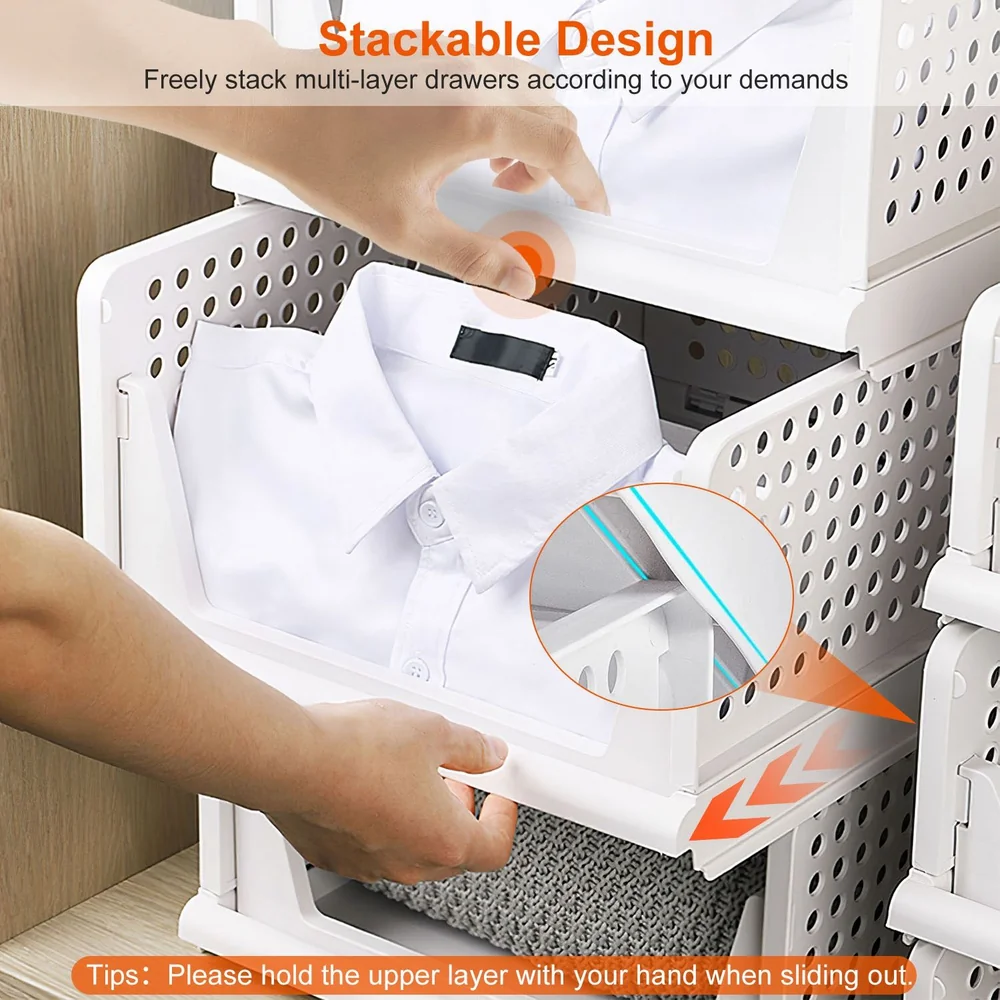 Hands operating a stackable multi-layer drawer organizer with folded shirts and a towel, showcasing its practical storage design.