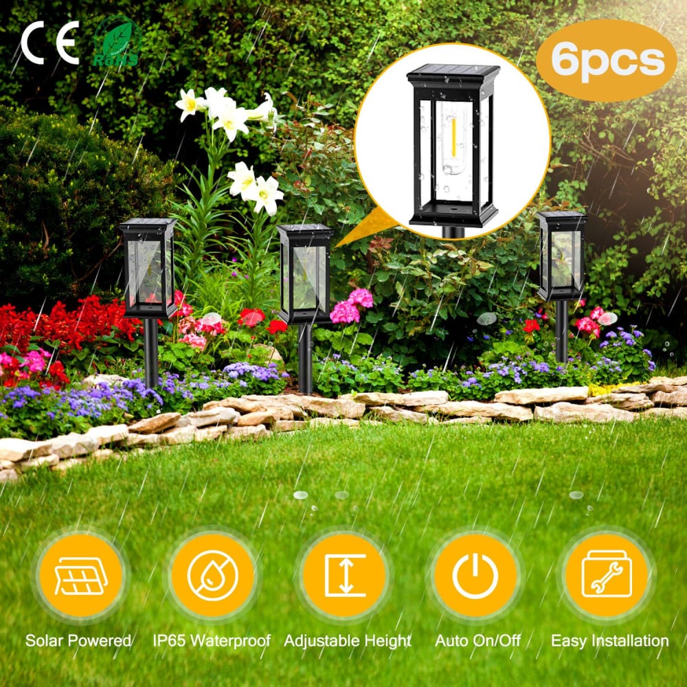 Solar-powered garden lights in a vibrant flower bed, featuring adjustable height and IP65 waterproof design, showcasing six units with auto on/off functionality, perfect for easy outdoor installation.