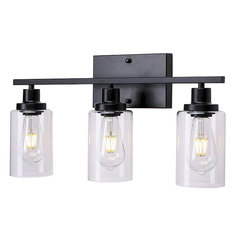 Three-light industrial-style wall sconce with clear glass shades and black metal accents, perfect for modern lighting decor.