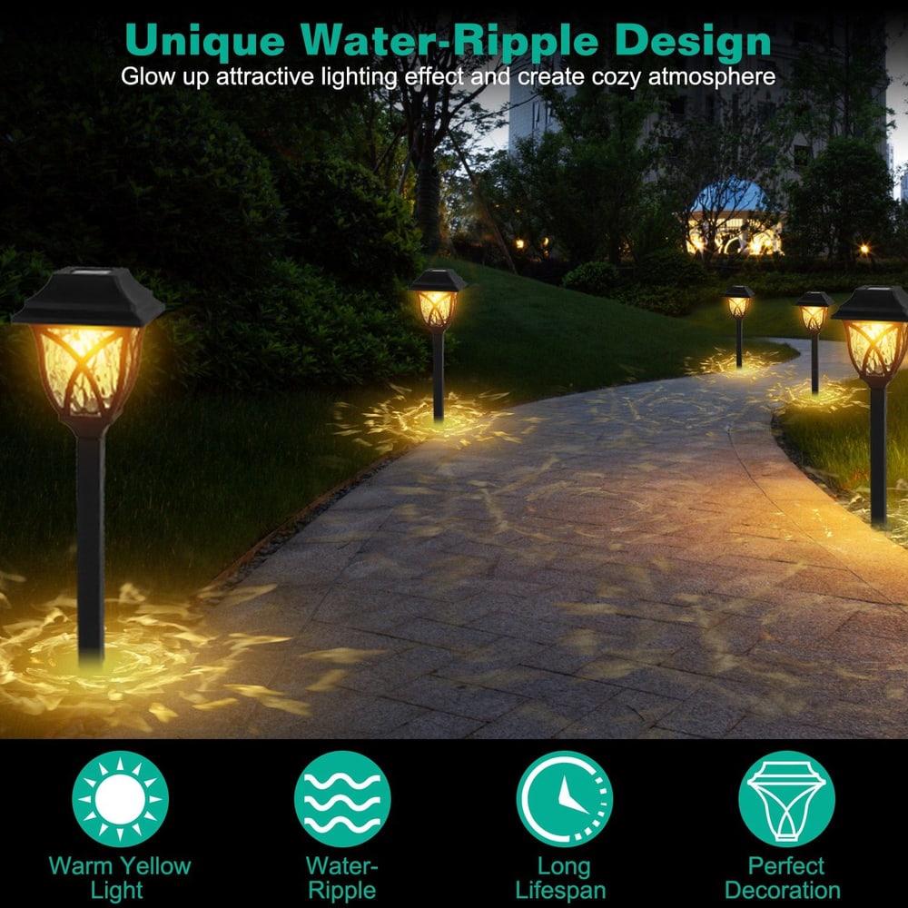 Solar-powered outdoor pathway lights with unique water-ripple design, casting warm yellow light along a garden path, enhancing nighttime ambiance and decoration.