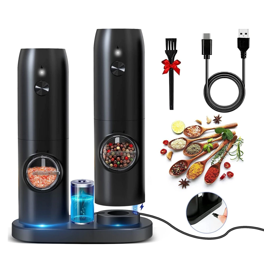Electric spice grinder set with two sleek black grinders, a USB charging cable, cleaning brush, and various spices on wooden spoons, designed for efficient spice blending and kitchen convenience.