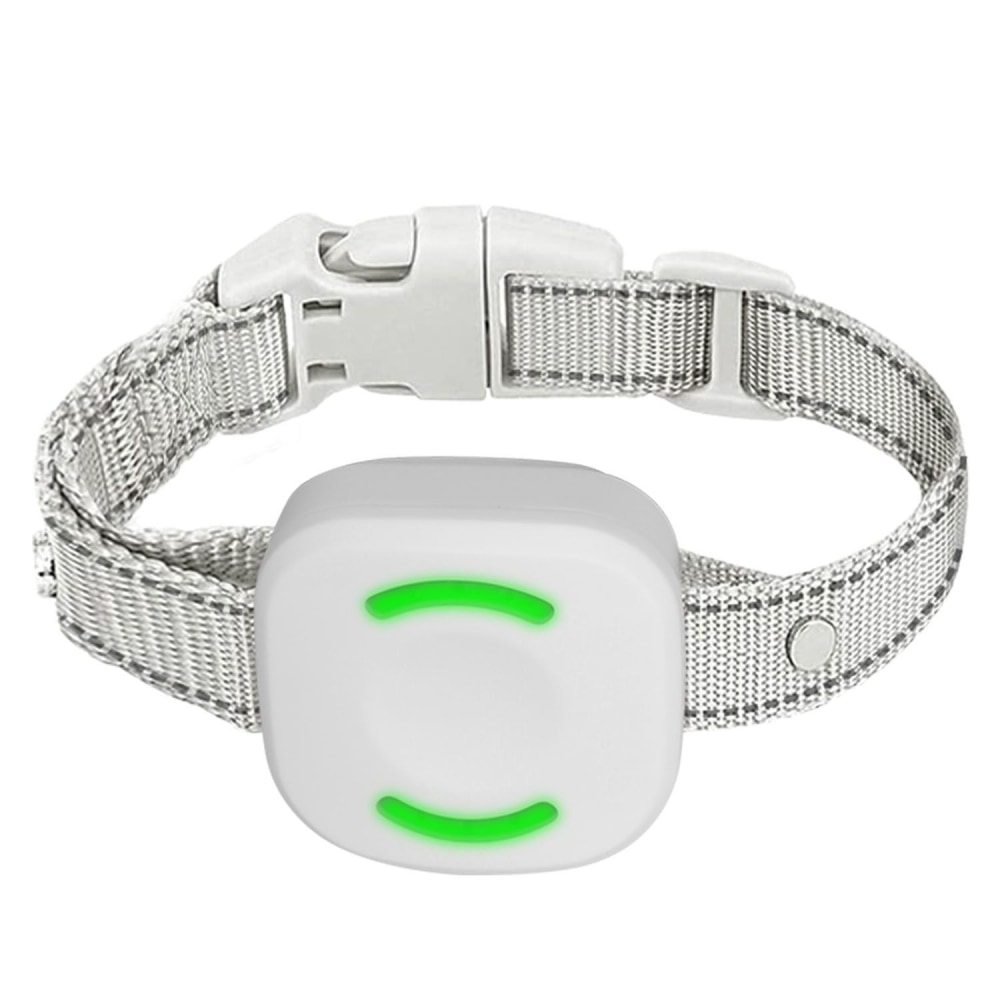 White smartwatch with a green light indicator on a silver fabric strap, designed for health monitoring and activity tracking.
