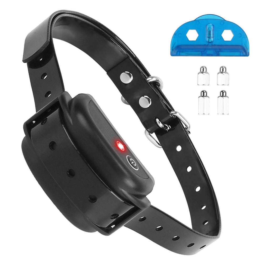 Black adjustable dog training collar with a red indicator light and included training tools.