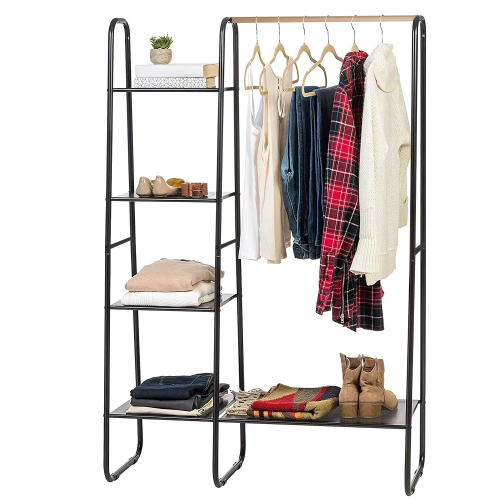 Stylish black clothing rack with wooden top bar, featuring hanging garments and multiple shelves displaying shoes, folded clothes, and a decorative plant.