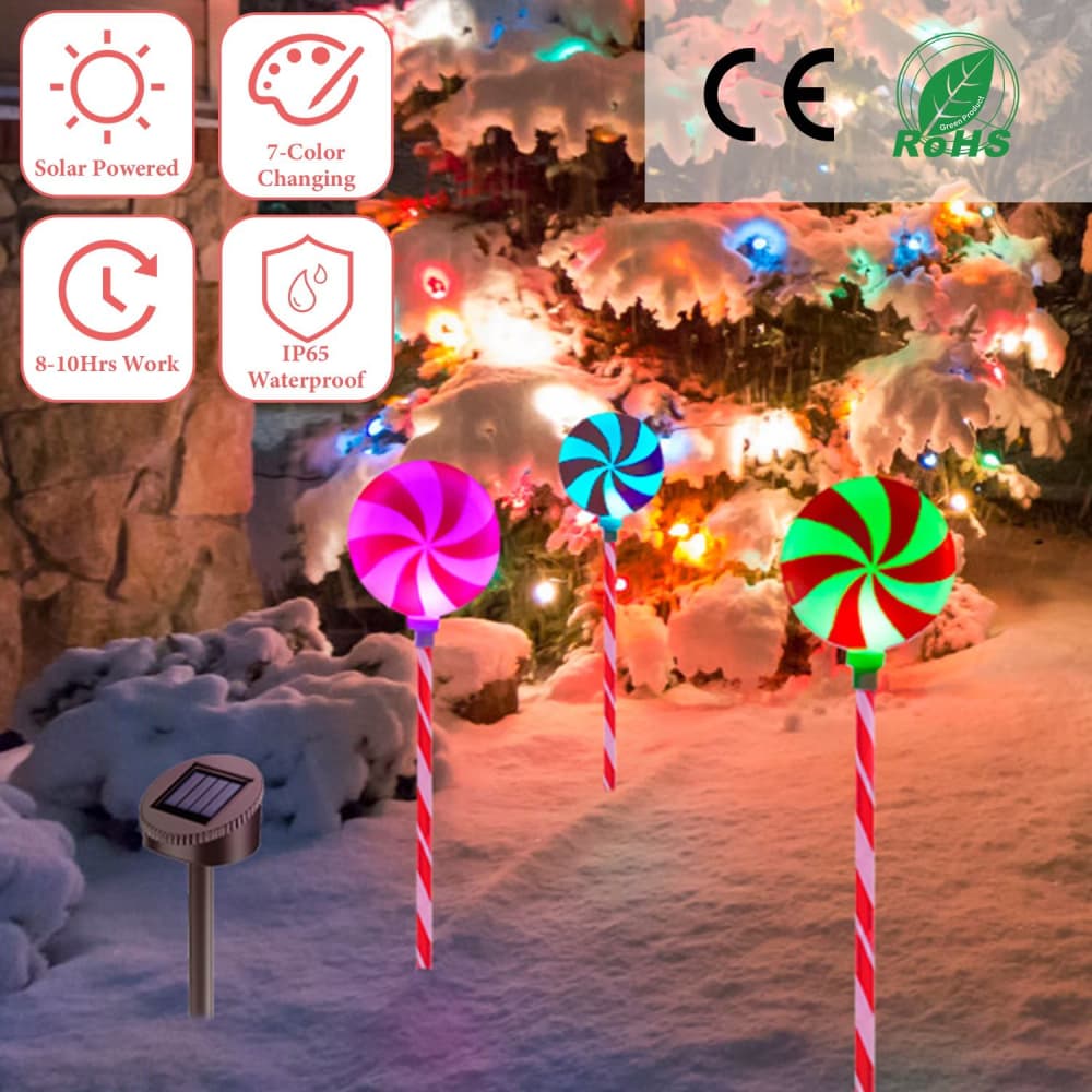 Colorful solar-powered lollipop garden lights in a snowy landscape, featuring seven color-changing patterns and IP65 waterproof design for festive outdoor decoration.