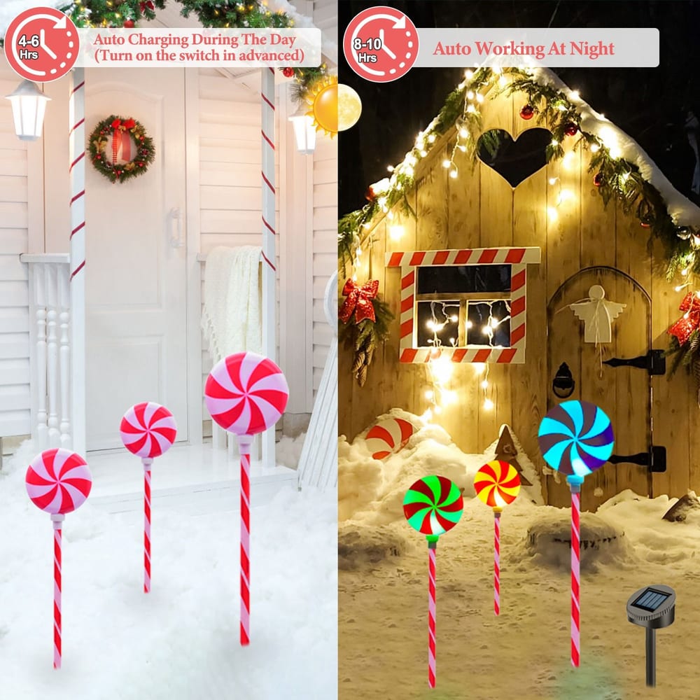 Colorful LED candy cane lawn stakes with pink and green swirls, illuminated at night, placed in a snowy outdoor holiday decor setting, showcasing a cozy home adorned with festive lights.