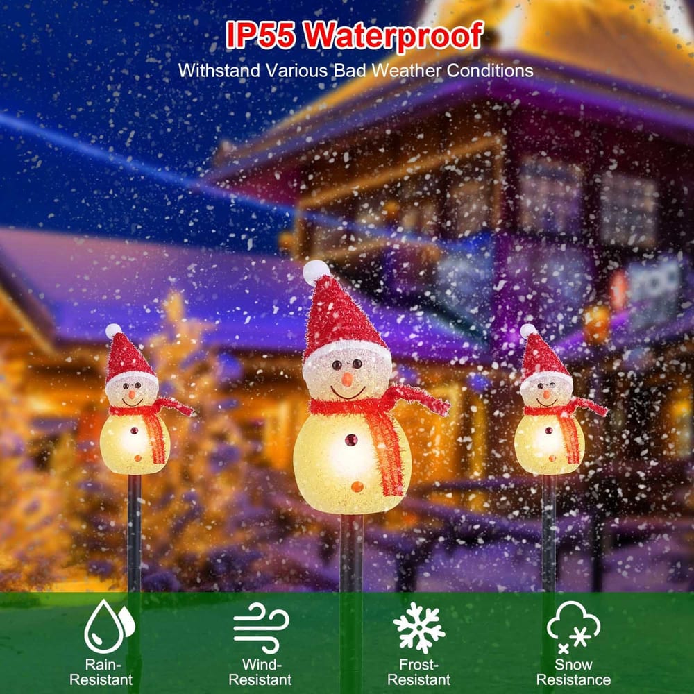 Three cheerful snowman garden lights with Santa hats, showcasing their IP55 waterproof features and resistance to rain, wind, frost, and snow, set against a snowy outdoor backdrop.