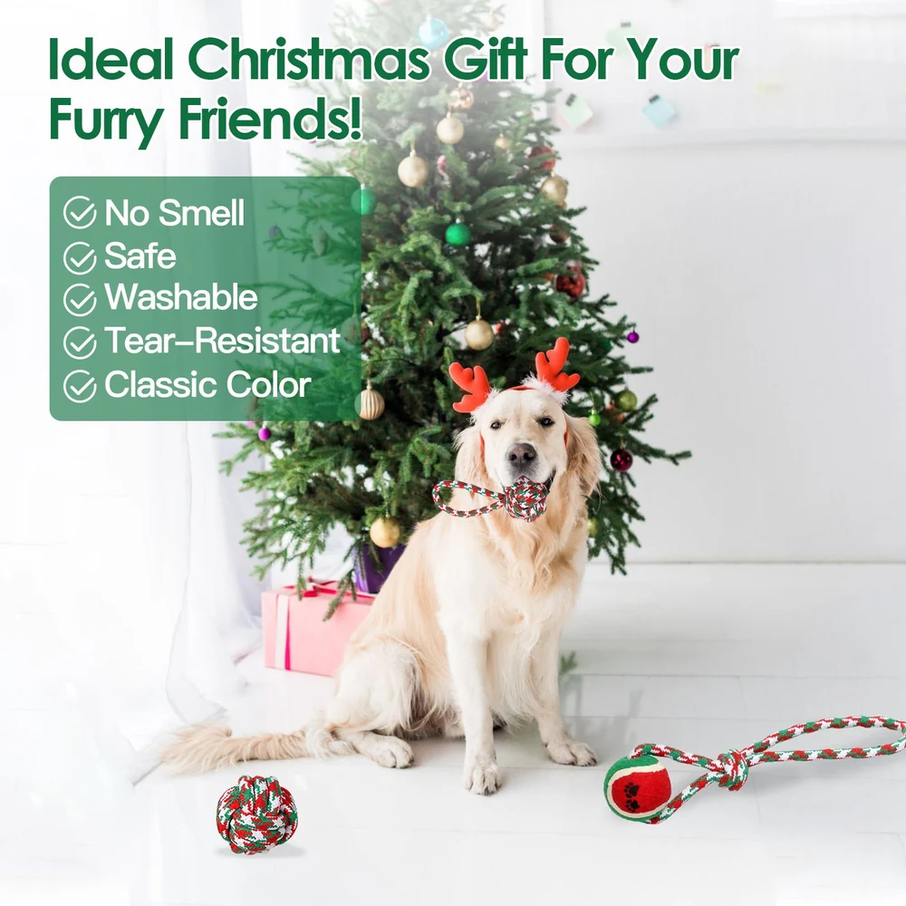 Golden retriever wearing reindeer antlers with a colorful chew toy, sitting in front of a Christmas tree, showcasing festive pet gift options that are safe, washable, tear-resistant, and odor-free.