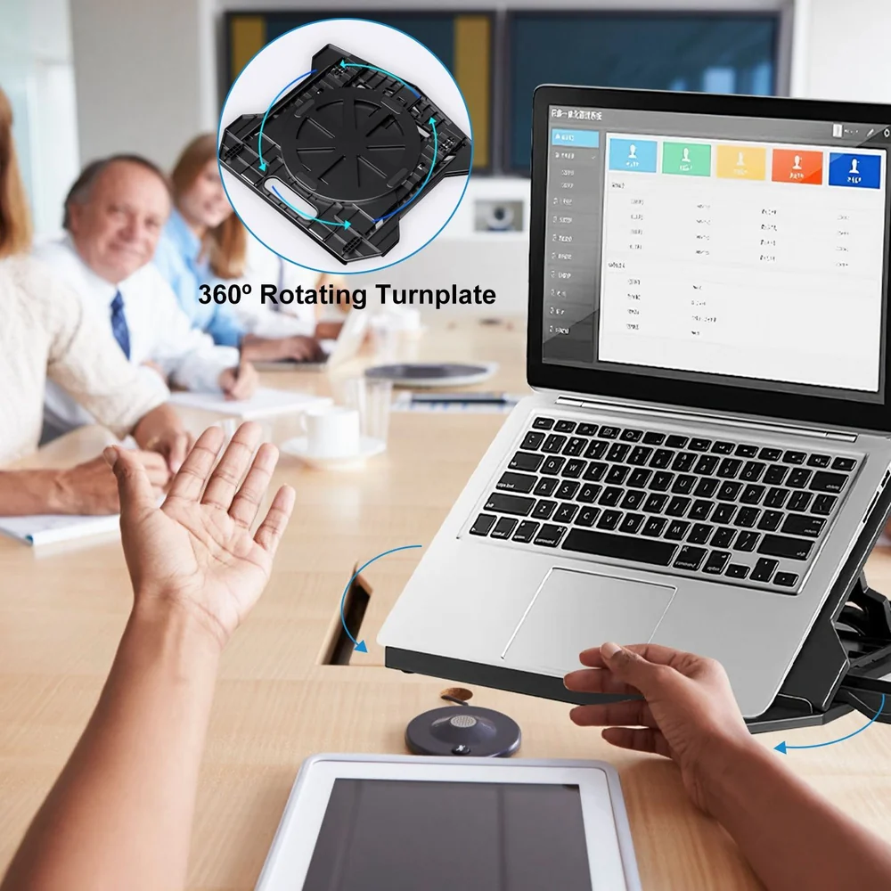 Laptop on a 360° rotating turnplate in a modern conference room, showcasing ease of use and collaboration during a meeting.