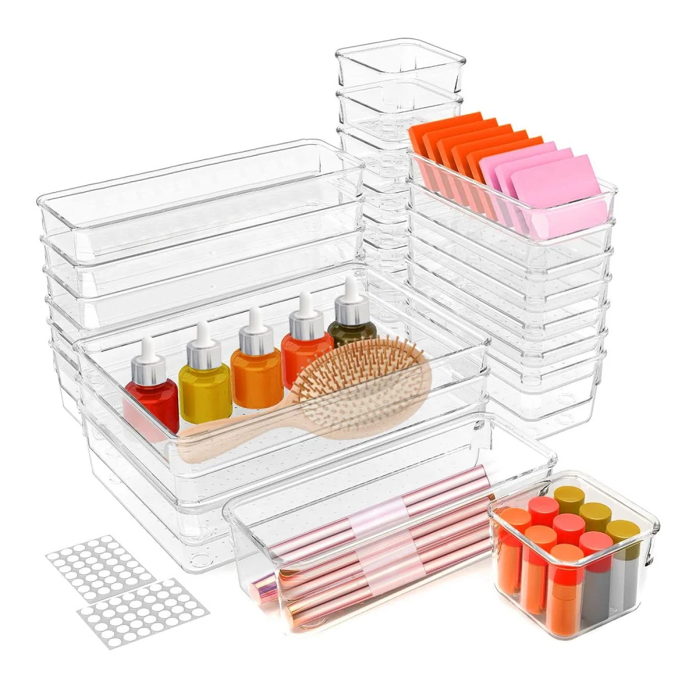 Transparent storage containers with colorful bottles, brushes, and accessories organized neatly for art and craft supplies.