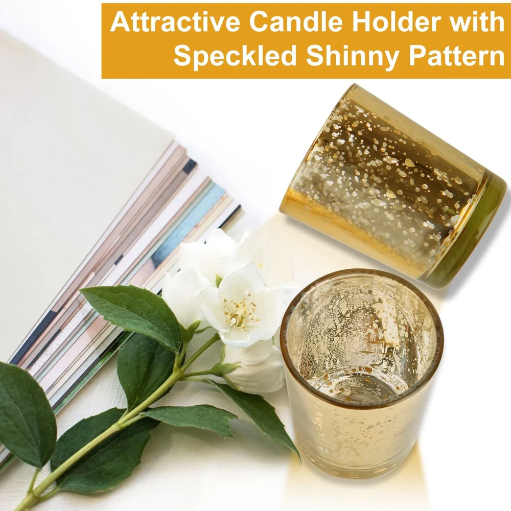Attractive speckled shiny candle holder in golden hue, surrounded by white flower and colorful paper sheets, perfect for home decor.