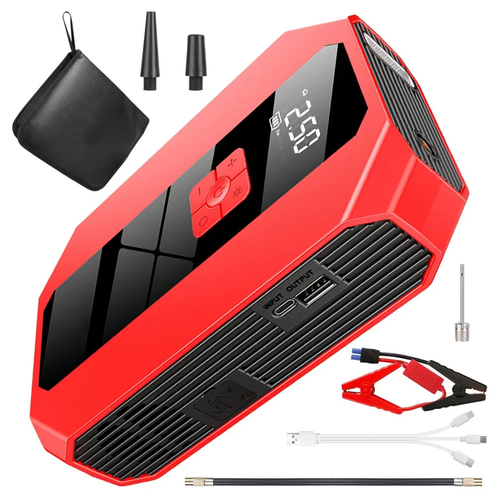 Portable car jump starter kit in vibrant red with digital display, USB ports, charging cables, and additional accessories for emergency vehicle starting and power supply.