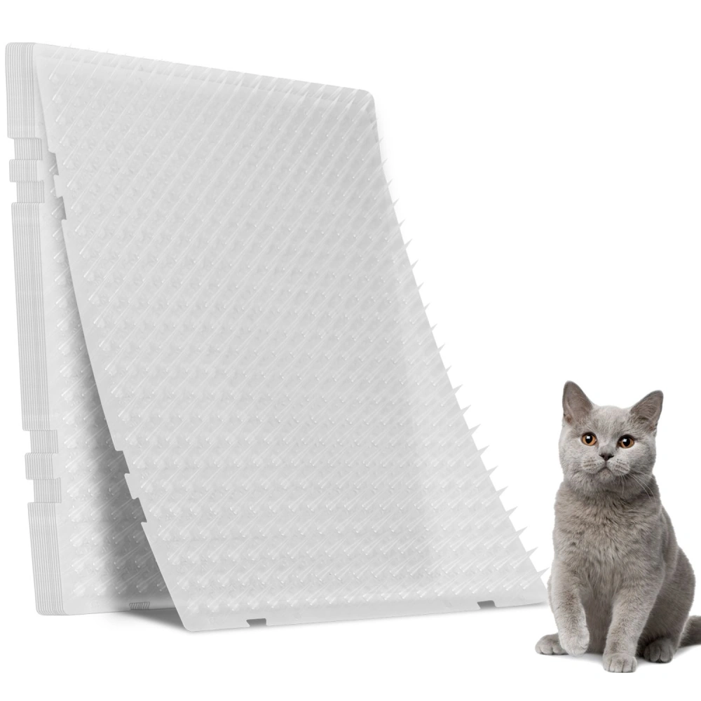 Durable clear pet grooming mat with textured surface next to a grey cat, designed to prevent slipping and provide comfort during grooming sessions.
