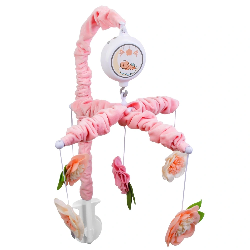 Pink baby crib mobile with floral decorations and a music box, designed to soothe infants with gentle tunes and calming visuals.