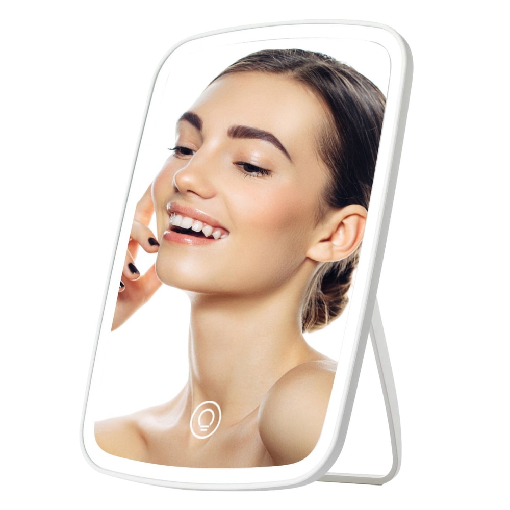 Illuminated cosmetic mirror with adjustable brightness, showcasing a woman's hand touching her chin, ideal for makeup application and skincare routines.