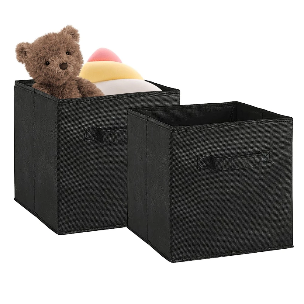Two black fabric storage bins, one filled with a plush bear and colored ice cream toy, showcasing organization and stylish decor for home storage solutions.
