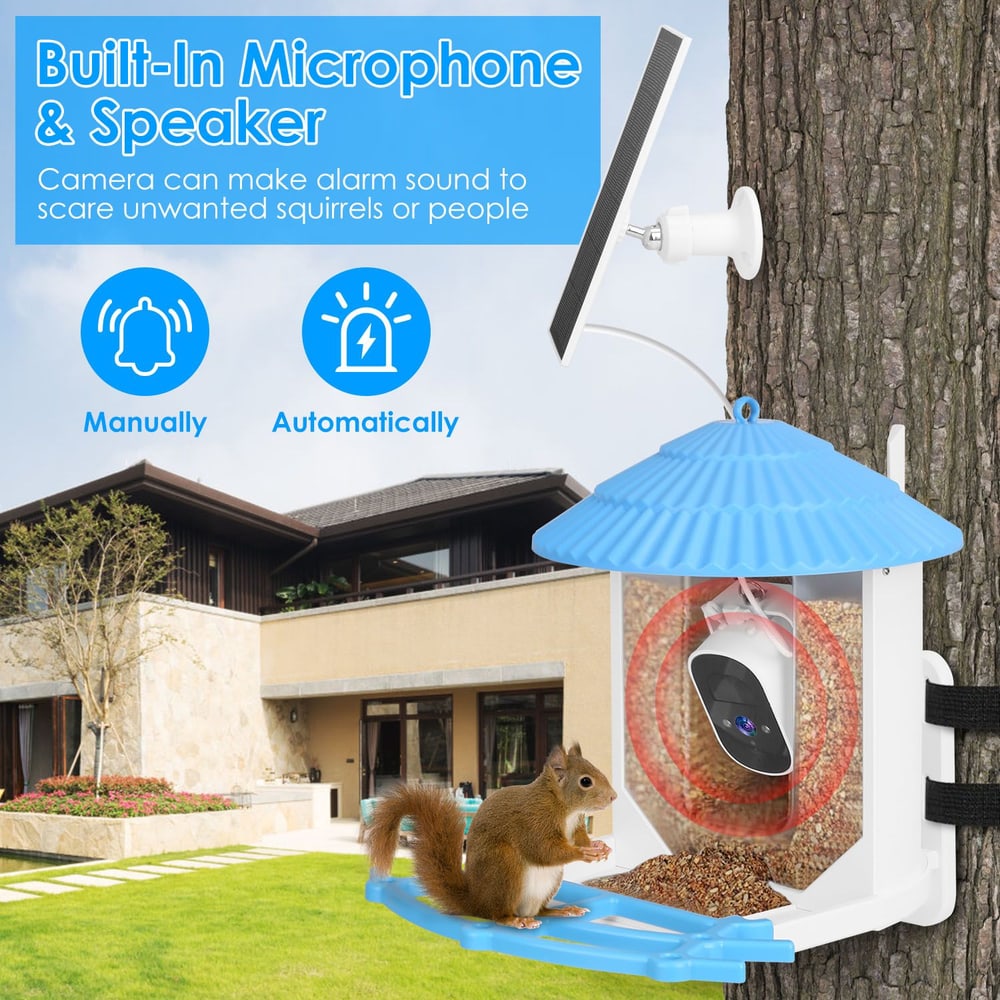 Squirrel feeder with built-in microphone and speaker for automatic and manual alarms to deter unwanted animals, featuring a solar panel and a camera, set in a backyard environment.