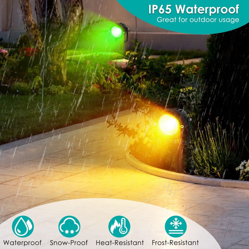 Outdoor IP65 waterproof garden lights in green and orange illuminating a pathway during rain, showcasing weather-resistant features like snow-proof, heat-resistant, and frost-resistant.