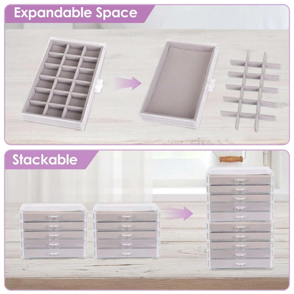 Transparent stackable jewelry organizer with expandable compartments, featuring soft gray interior dividers for custom storage solutions.