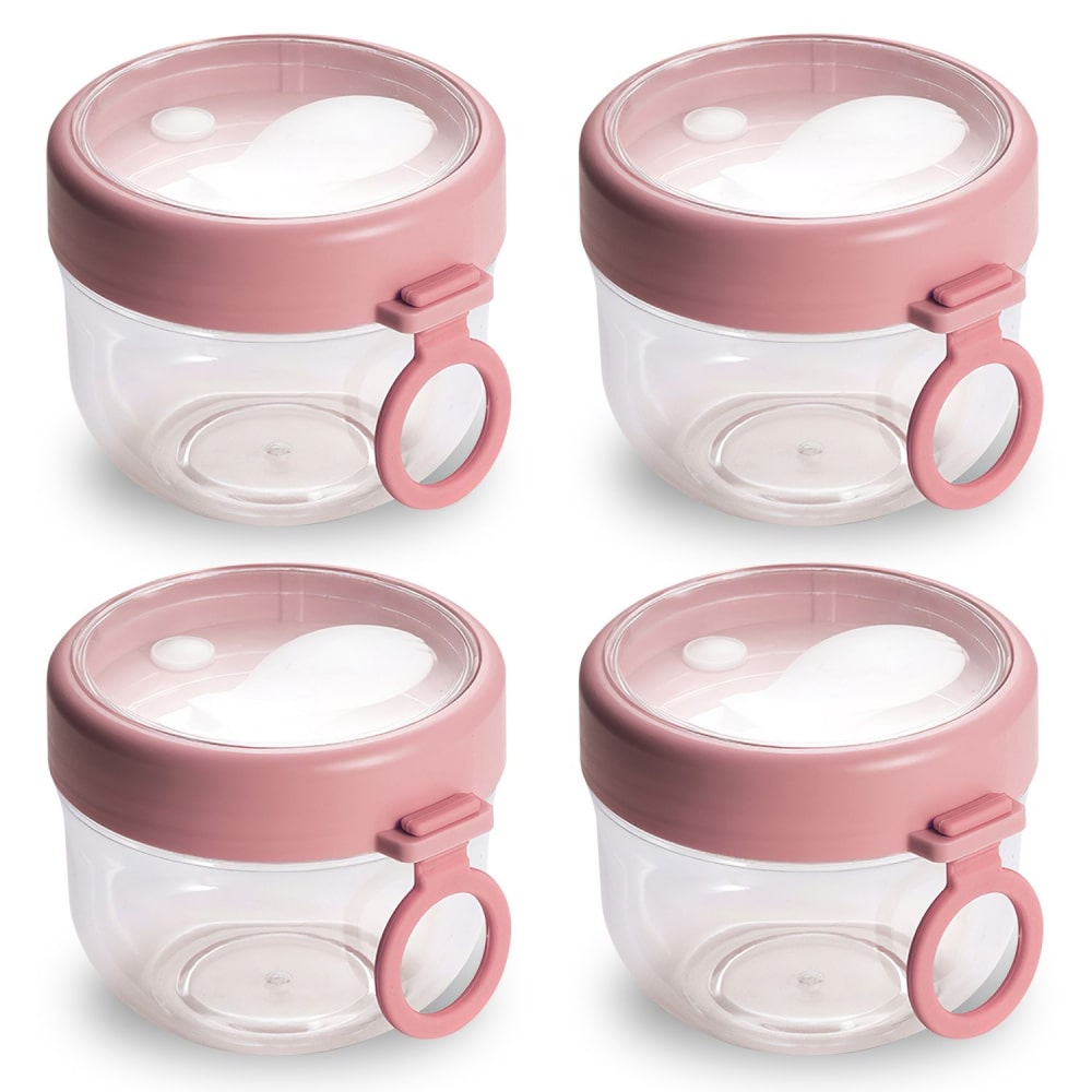 Set of four transparent glass storage containers with pink lids and handles, ideal for organizing food or small items.
