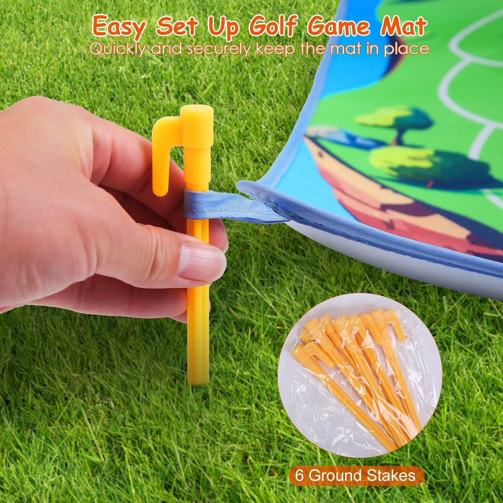 Person setting up a colorful golf game mat on grass using a yellow ground stake, with a package of six additional stakes visible in the image.