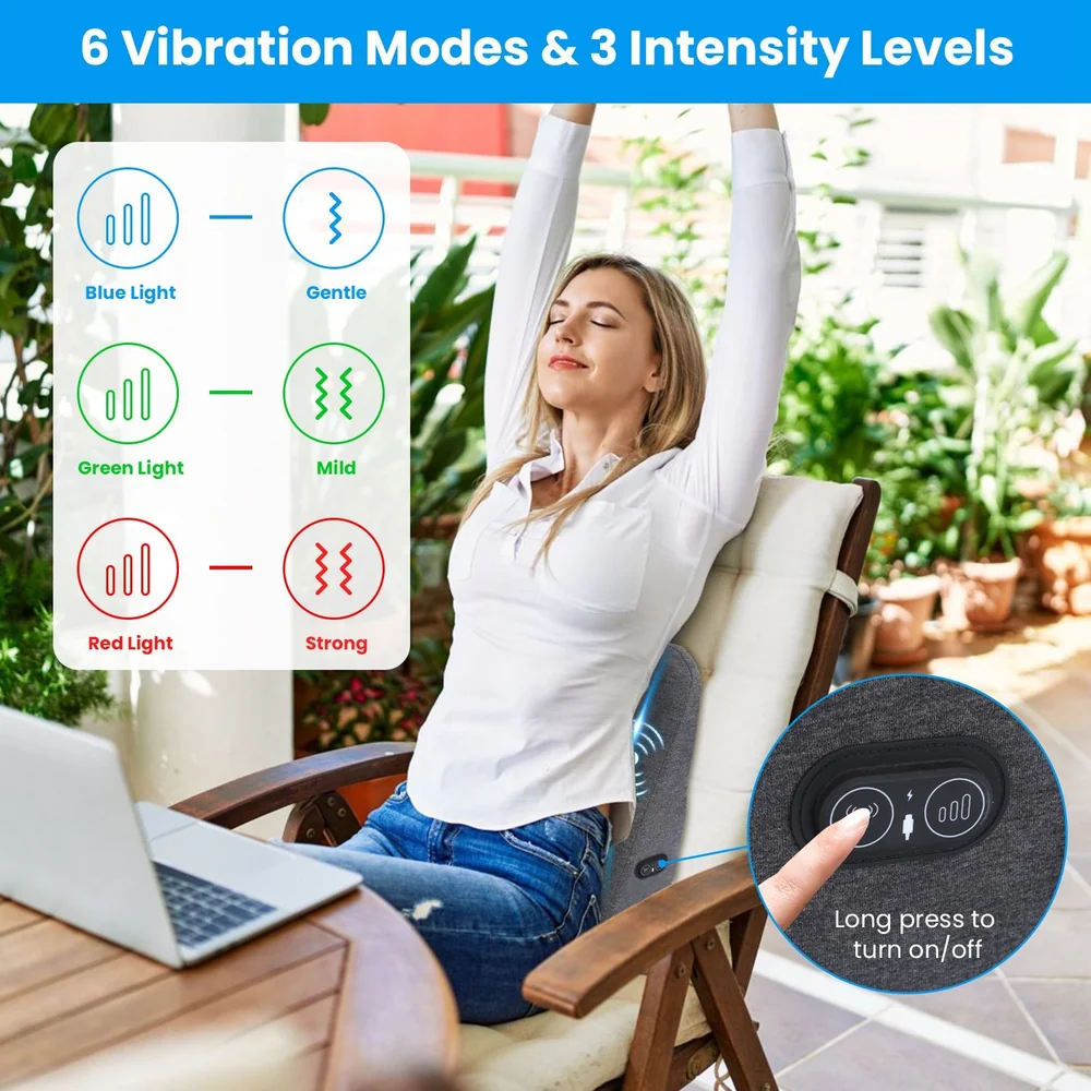 Adult woman relaxing in a chair with a massage device on her back, featuring 6 vibration modes and 3 intensity levels, alongside a laptop on a wooden table, surrounded by indoor plants.