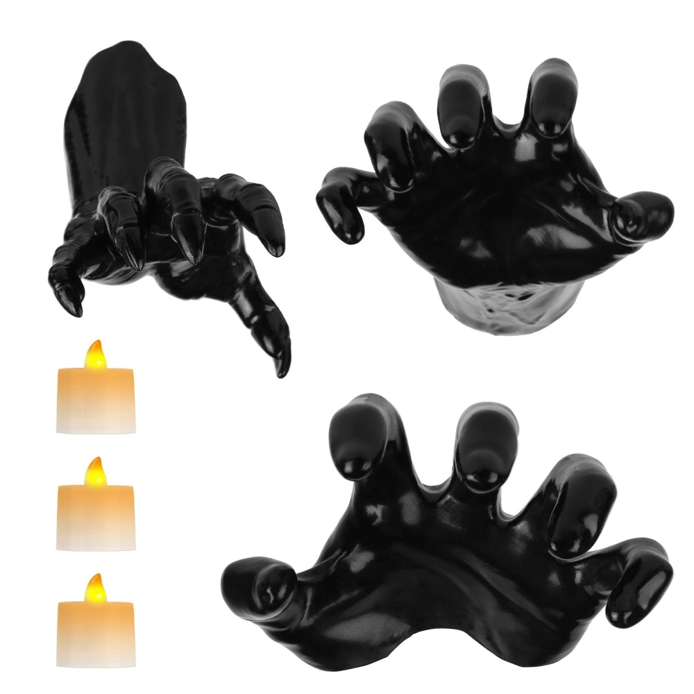 Black Halloween decoration hands reaching out, perfect for spooky displays alongside LED candles.