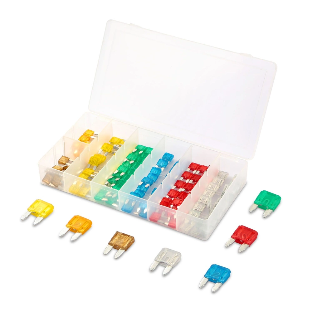 Color-coded automobile fuses organized in a clear plastic storage box, featuring various amperage ratings in yellow, green, red, blue, and transparent, with several fuses displayed outside the container.
