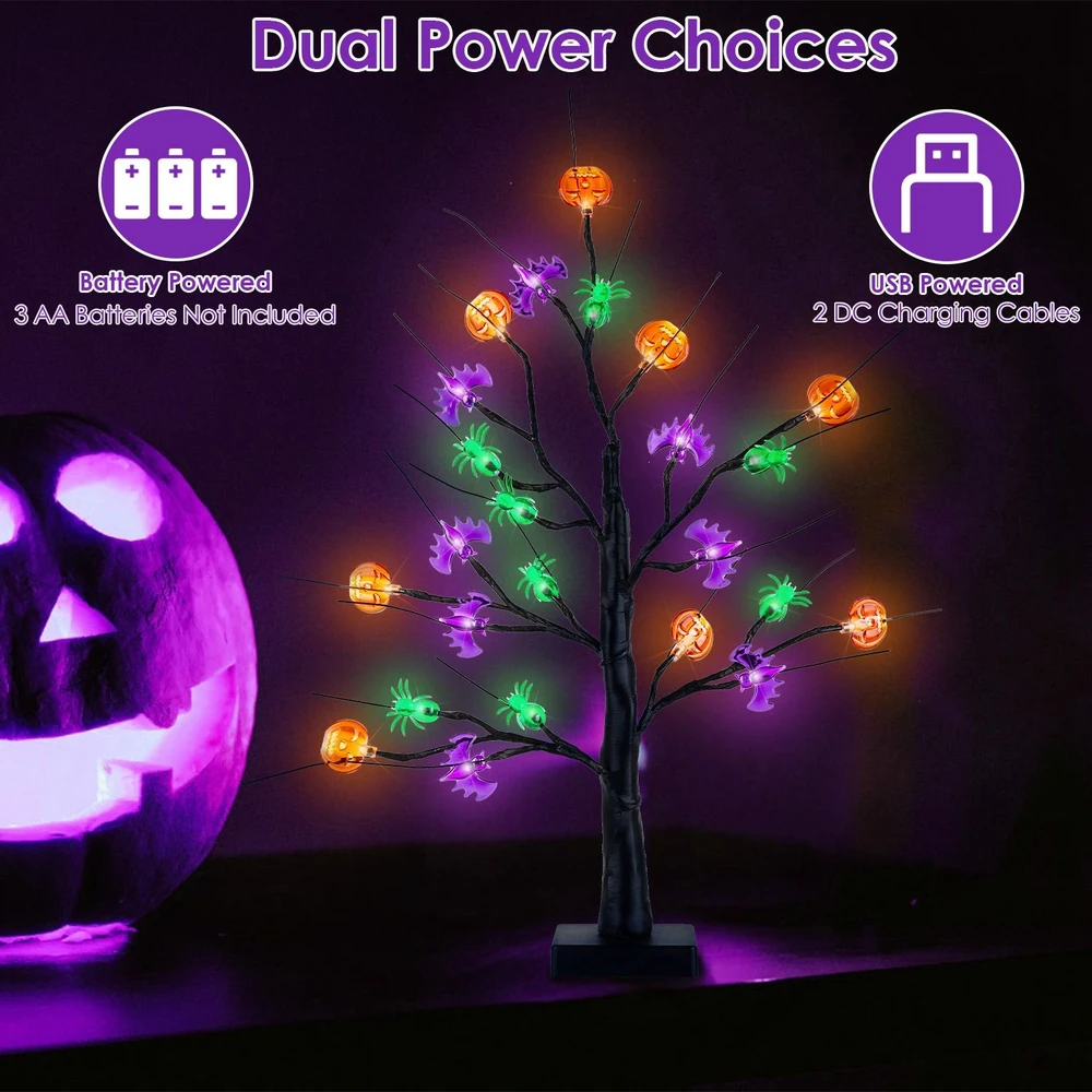 Halloween decorative tree with LED lights, featuring orange jack-o'-lanterns and green spiders, powered by batteries or USB, set against a dark background with a glowing purple pumpkin.