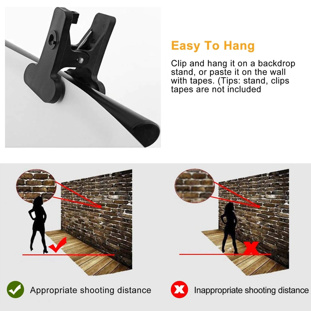 Black backdrop clip holder displayed with instructions on hanging methods and appropriate shooting distances for photography.