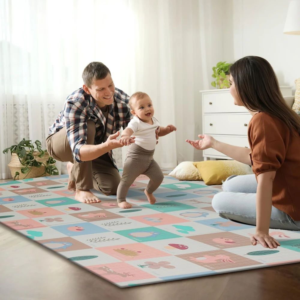 Baby learning to walk on a colorful play mat while parents encourage and support, showcasing a safe and engaging indoor environment for early childhood development.