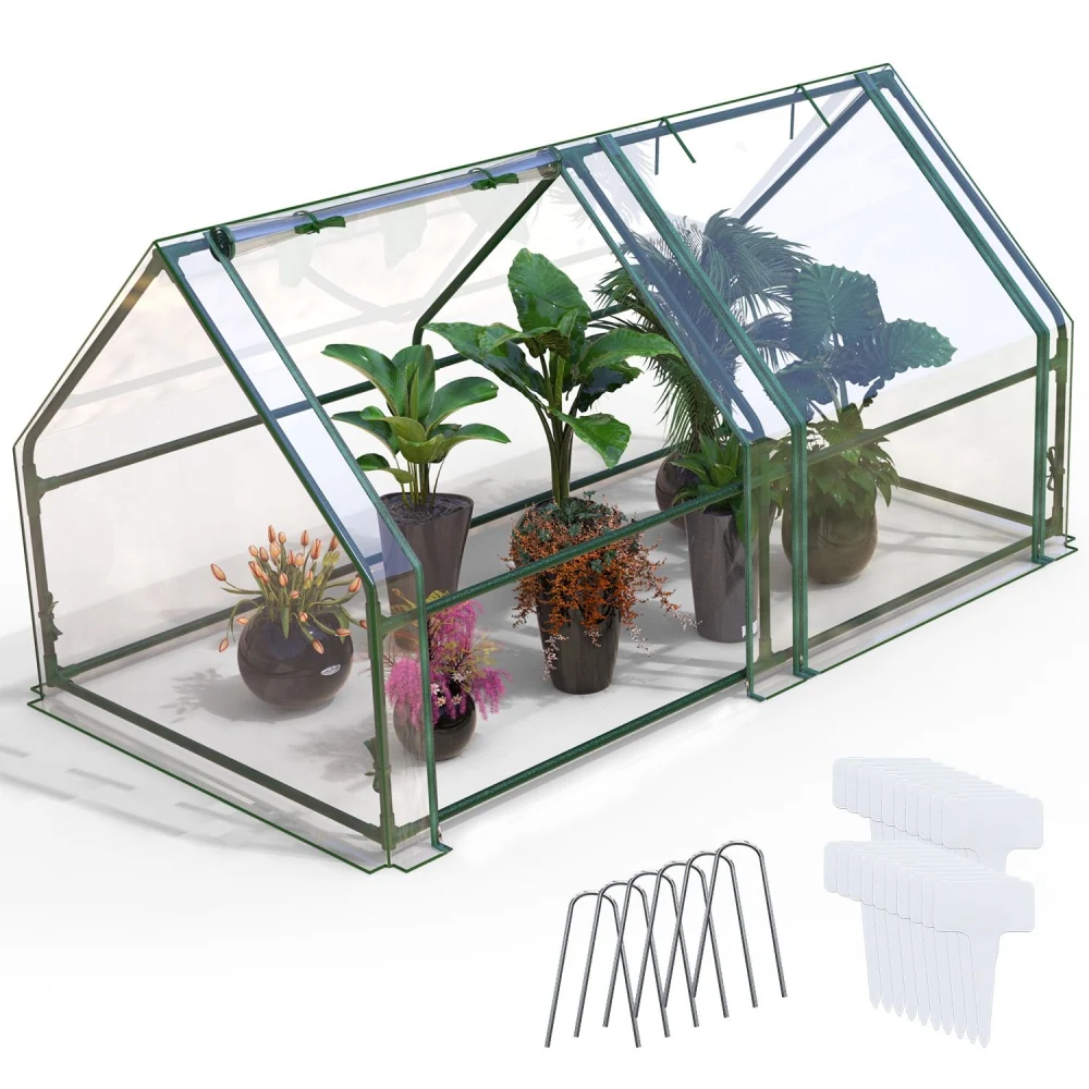 Mini greenhouse with transparent panels showcasing vibrant potted plants, surrounded by planting accessories including metal stakes and plant markers.